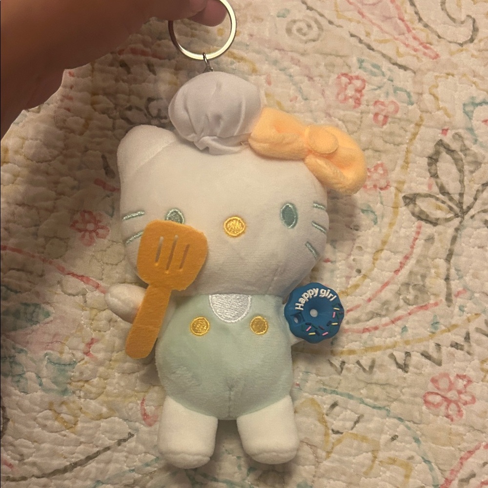 Sanrio Hello Kitty Pastel Plush Keychain with Yellow Bow and Blue Donut